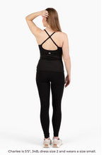 Load image into Gallery viewer, Size small model wearing Black COMFYIST camisole top crossback straps back view - COMFYIST CAMI
